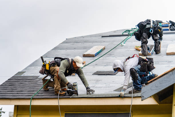 Professional Gutter Installation technician working in Tres Pinos, CA